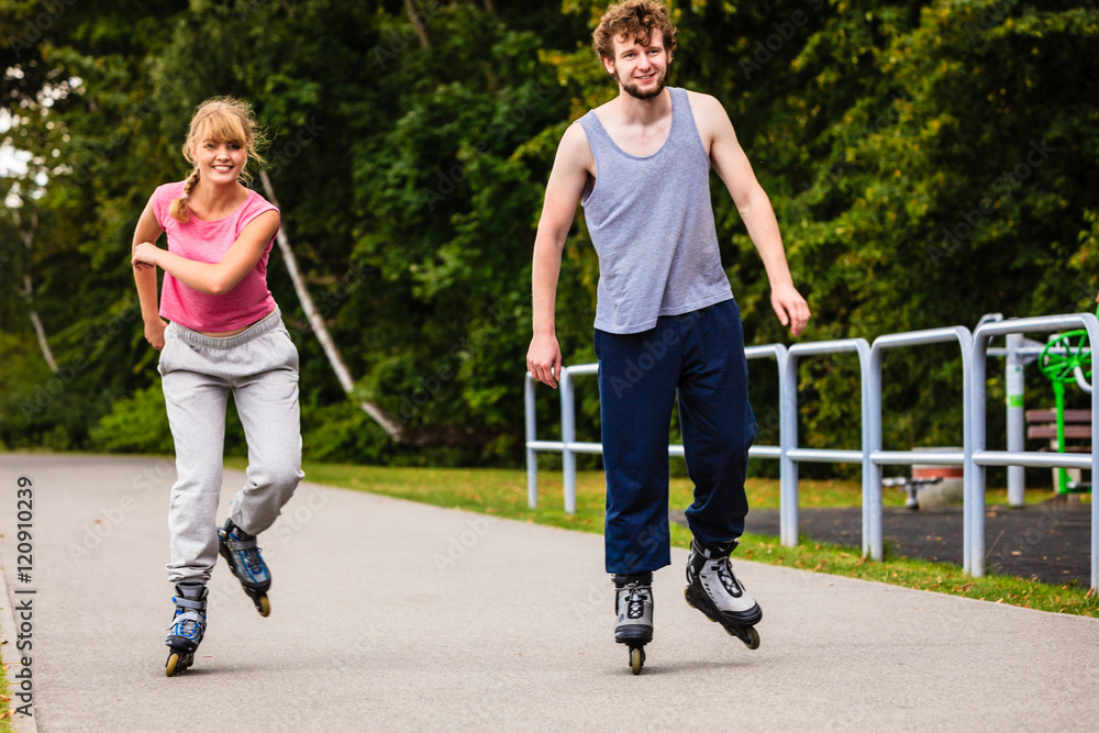 Fototapeta premium Young people casually rollblading together.