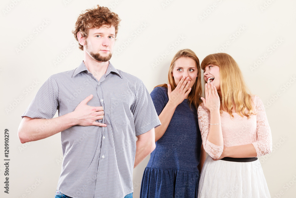 Two women talking gossiping about man. Two women talking gossiping about man.