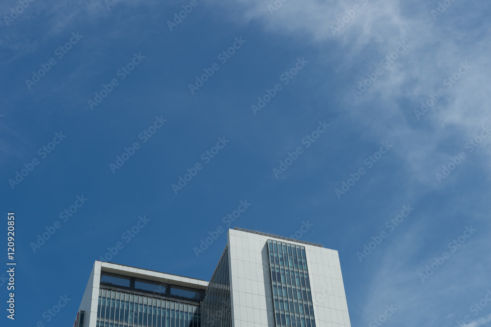 Office building in the city under blue sky Office building in the city under blue sky