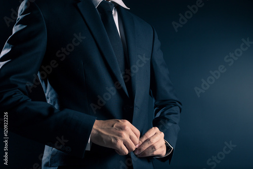 Businessman Dressing Up a Black Suit