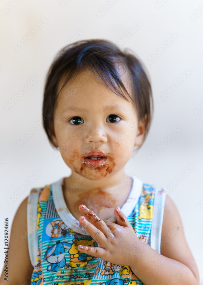 Portrait cute girl eating chocolate ice cream. Portrait cute girl eating chocolate ice cream.