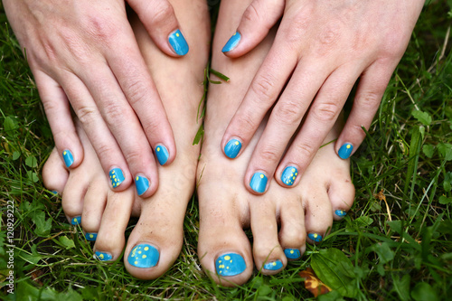 feet and hands with creative teens manicure