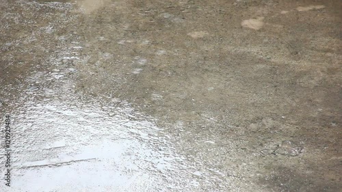Raining Water Drops On Empty Cement Ground Footage