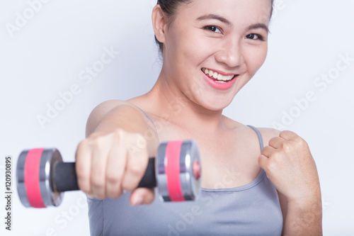 Woman exercise with dumbbell