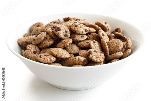 Bowl of chocolate chip cookies cereal isolated on white.