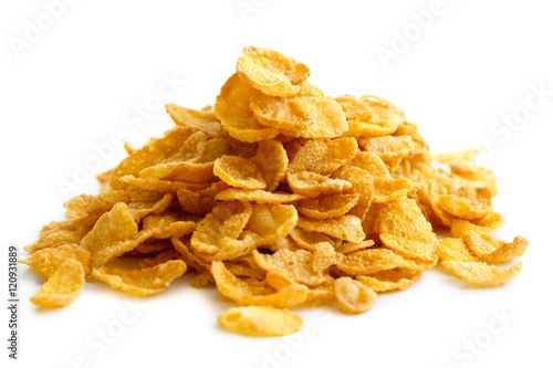Heap of cornflakes isolated on white.