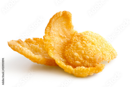 Group of three cornflakes isolated on white.