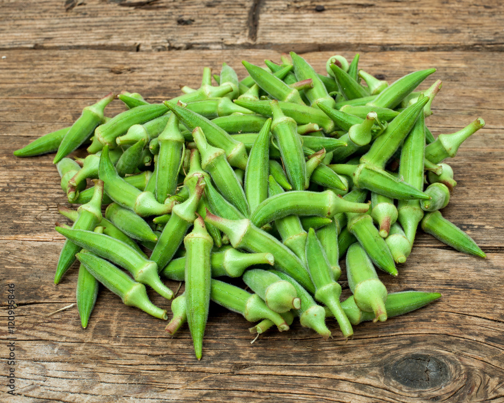  okra on a wooden table