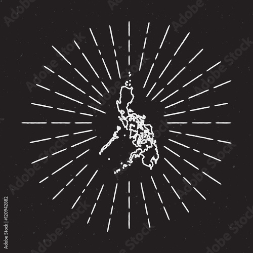 Philippines vector map outline with a vintage sunburst border, featuring hand-drawn elements and radiant light rays on a black background. photo