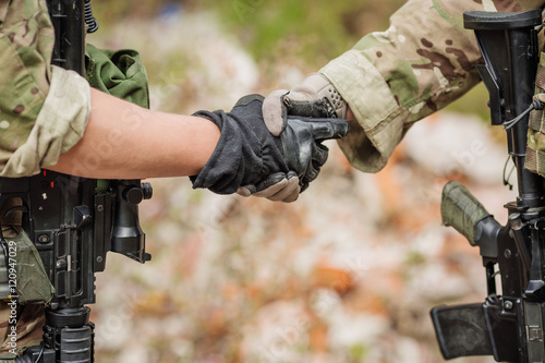 Soldier shaking hands on outdoor