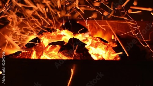 fire flames with sparks on a black background