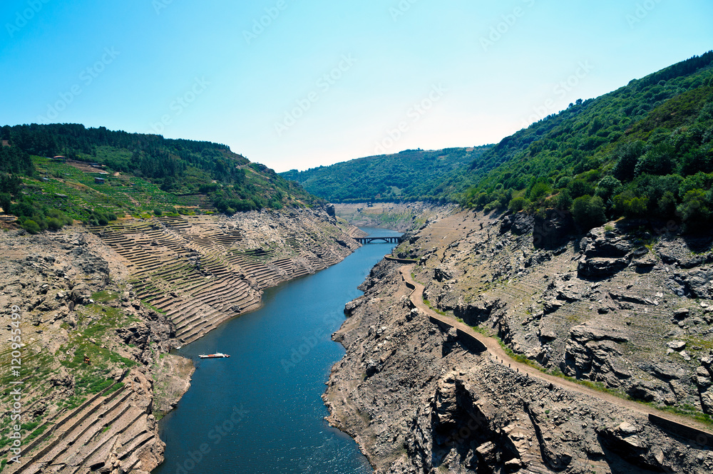 Landscapes of . Ruins of the village of Chave (normally submerged), strains and terraces of vineyards in the Ribeira Sacra,  Galicia, Spain