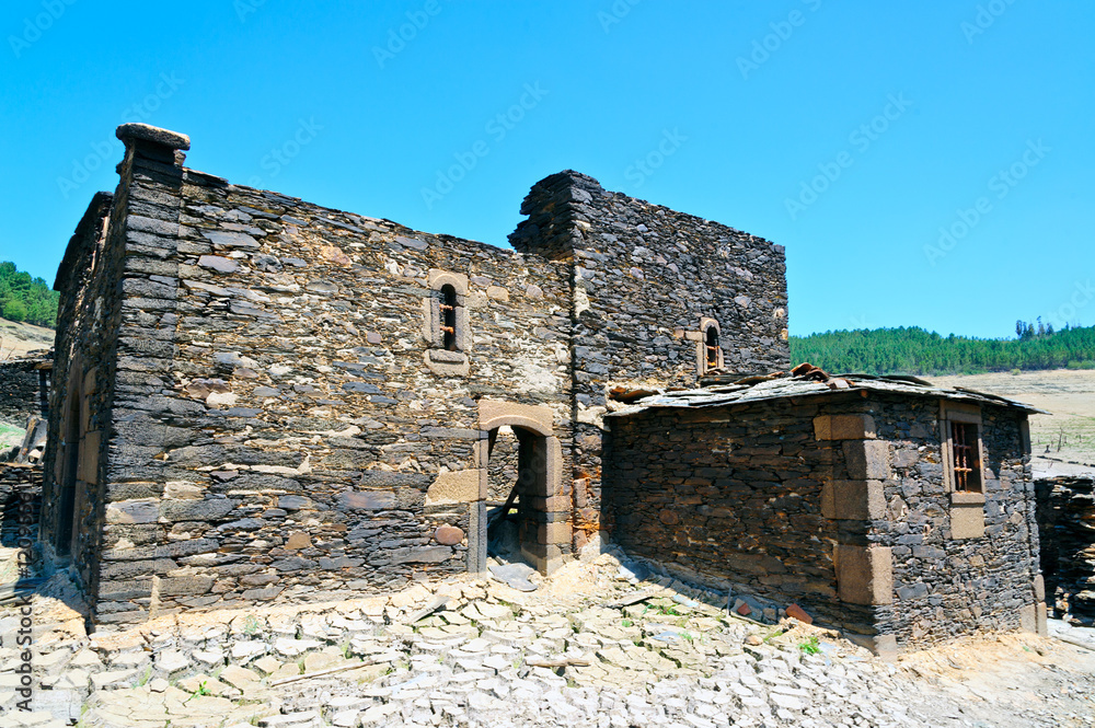 landscapes of  Ruins of the village of Chave (normally submerged), strains and terraces of vineyards in the Ribeira Sacra,  Galicia, Spain