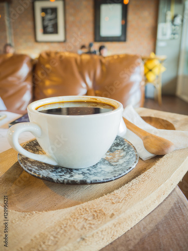 Cappuccino coffee on the table, vintage warm tone