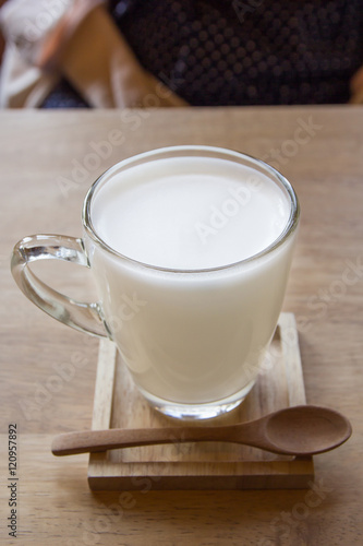 Milk in glass on table