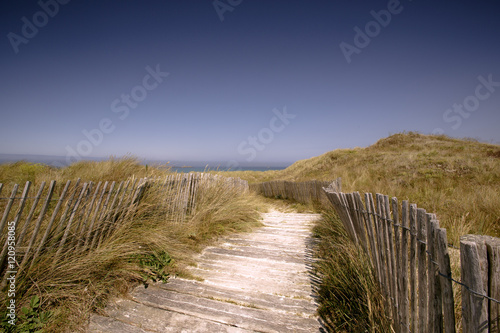 Fototapeta Naklejka Na Ścianę i Meble -  Beach with Path and Fence in Brittany
