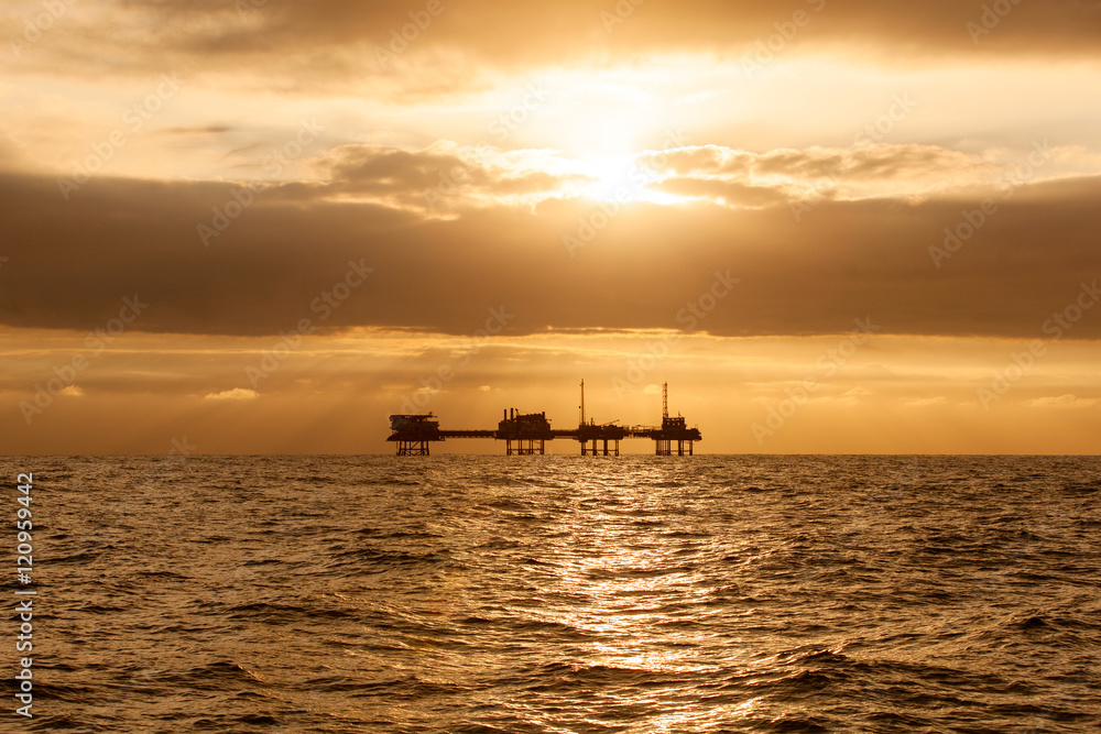 Silhouette of offshore oil installation
