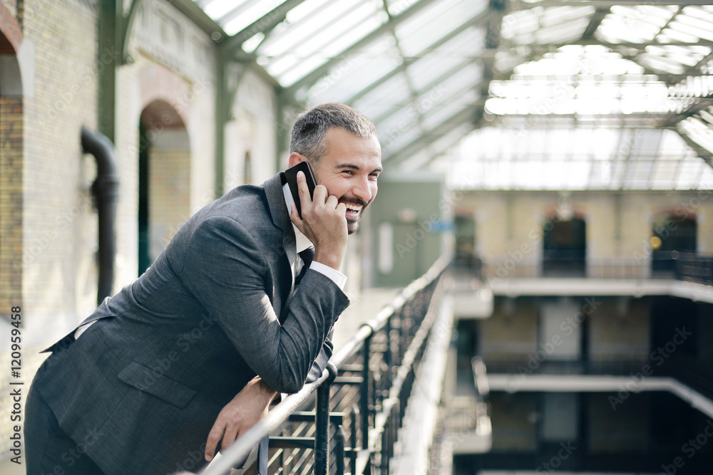 Businessman talking at the phone Businessman talking at the phone