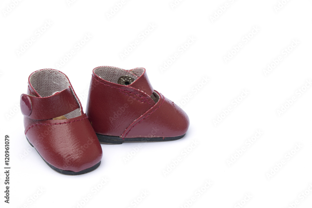Vintage Red Leather Doll Shoes On White Background