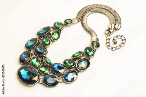 Necklace of blue and green stones closeup