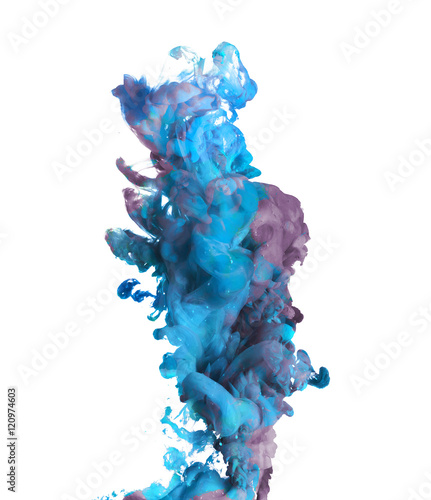 Blue and purple paint dropped in water