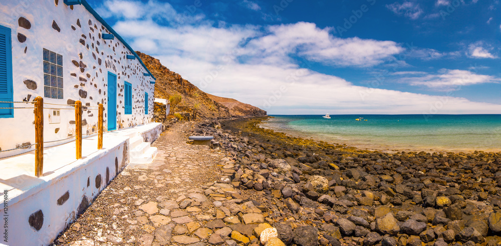 Fishing village Pozo Negro with stone and sand beach, Fuerteventura, Canary Island, Spain.