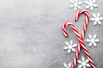 Candy cane. Christmas decors with gray background.