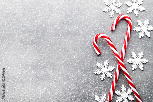 Candy cane. Christmas decors with gray background.