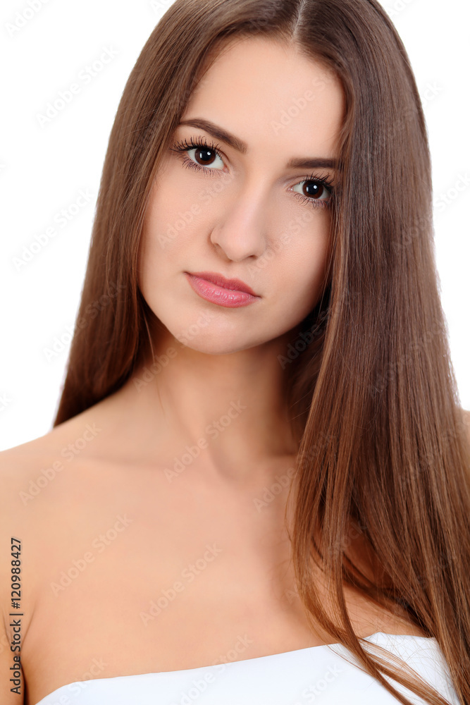 Young beautiful brunette woman face portrait with healthy skin. Isolated background Young beautiful brunette woman face portrait with healthy skin. Isolated background