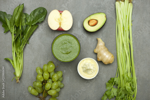 Green fruit and vegetables with ginger avocado apple grape and s