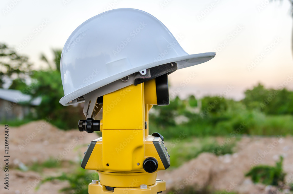 Closeup theodolite outdoors at construction road Selective focus. Closeup theodolite outdoors at construction road Selective focus.