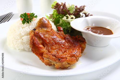 Canvas Print Vietnamese ribs broken rice or com tam suon on white plate