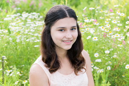 Portrait of cute girl with hairstyle of long hair on the outside