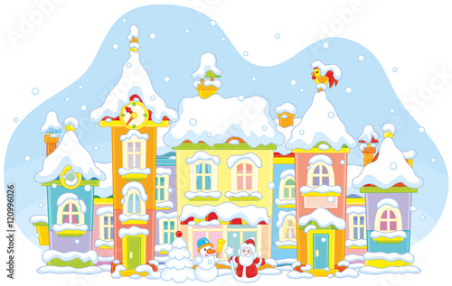 toy town with colorful houses covered with snow on Christmas