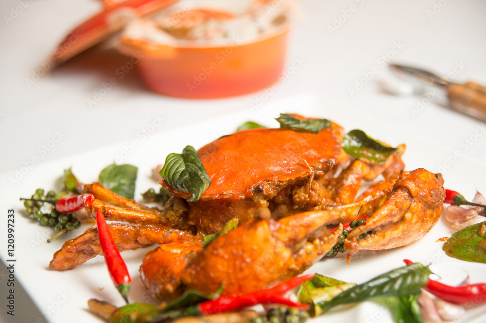 Wok fried crab with chilli and sweet Thai basil horizontal Wok fried crab with chilli and sweet Thai basil horizontal