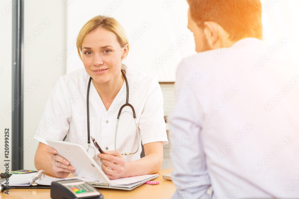 Young attractive woman doctor taking health insurance card Young attractive woman doctor taking health insurance card