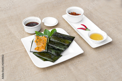 Vietnamese steamed rice pancake with shrimp or banh nam Hue on w