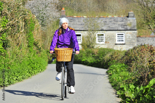 Young woman on the bicycle