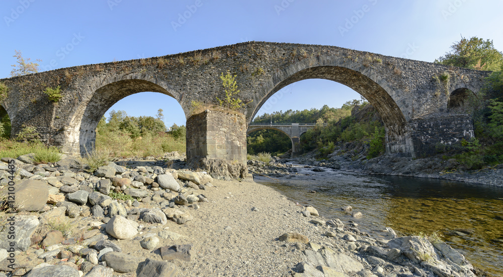 medieval bridge near santa Maria alla Croce abbey, Tiglieto, Ita