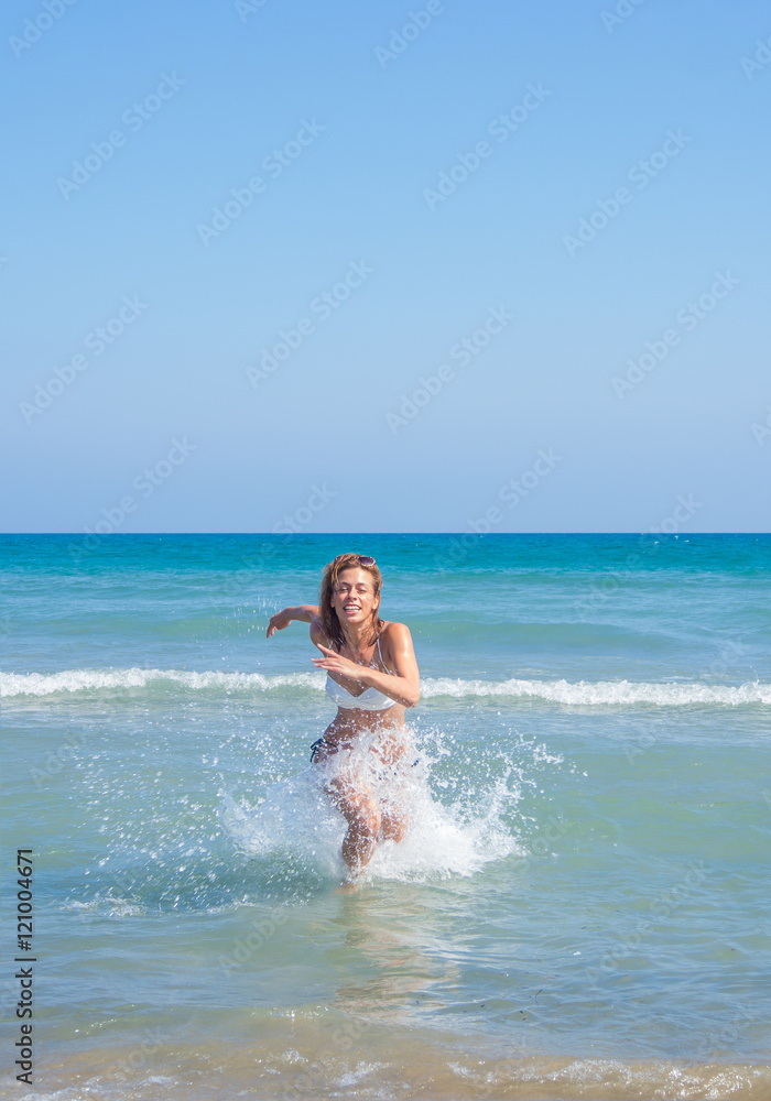 Woman in bikini enjoying the sea Woman in bikini enjoying the sea