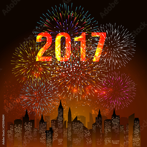 fireworks display for happy new year 2017 above the city