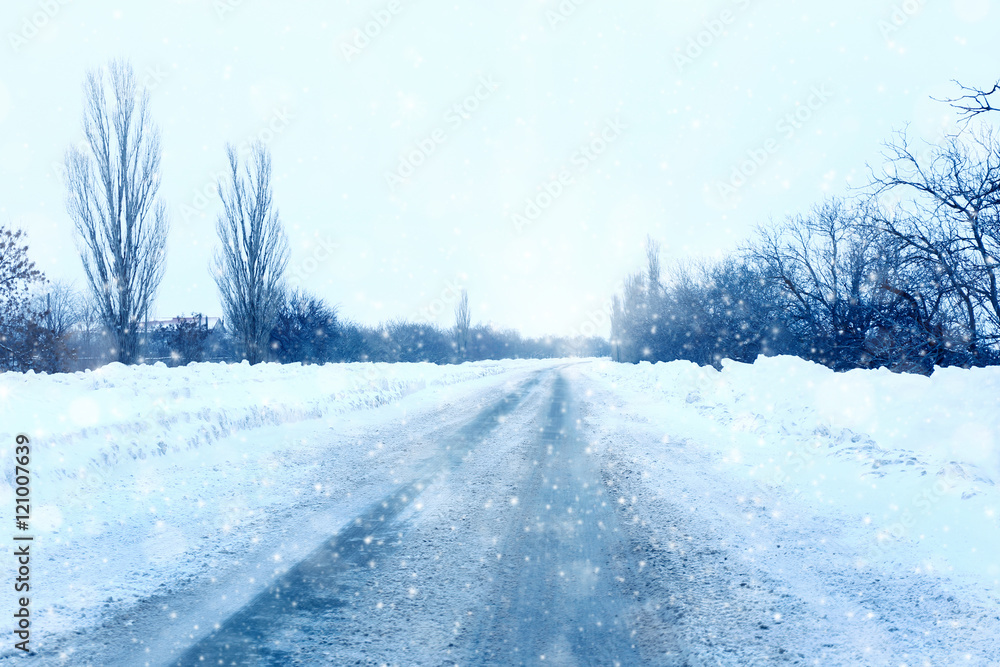 Fototapeta premium Rural road with snow. Winter concept.