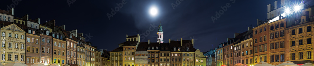 Old Town in Warsaw at night, panorama of the Old Town Square. Old Town in Warsaw at night, panorama of the Old Town Square.