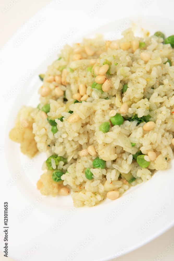 Rice of Risotto with vegetables and beans on white plate Rice of Risotto with vegetables and beans on white plate