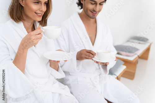 Mature couple relaxing together at day spa
