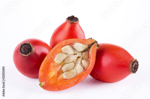 Canvas-taulu Rose hips with fruit cross-section over white