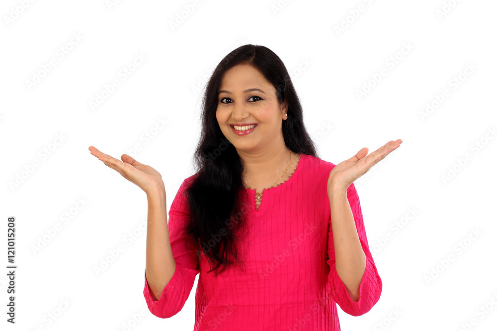 Happy young woman showing blank copy space Happy young woman showing blank copy space