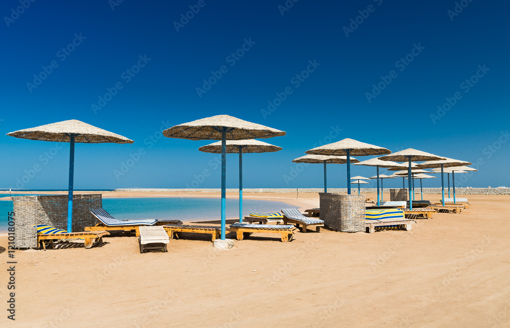 Fototapeta premium Sunshade umbrellas on the beach