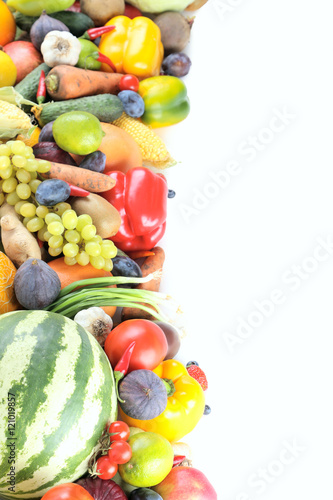 Fototapeta Naklejka Na Ścianę i Meble -  Ripe and tasty fruits and vegetables on a white background