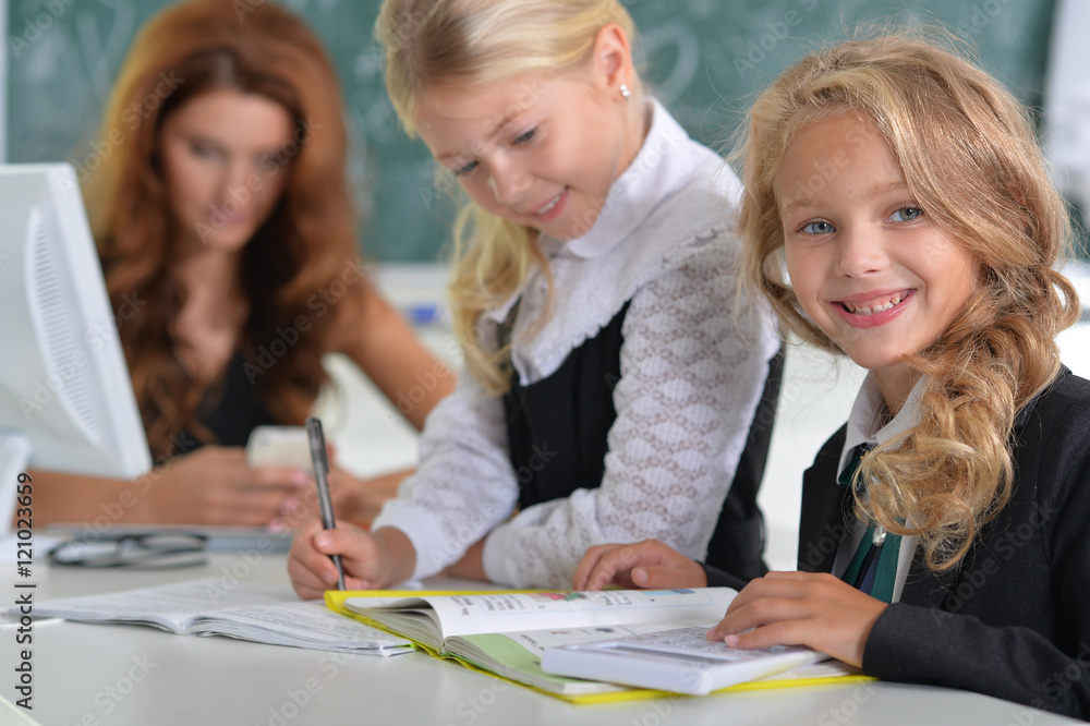 teacher with two girls at lesson teacher with two girls at lesson